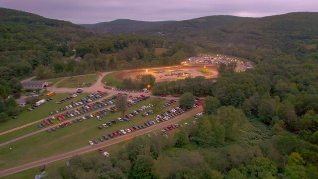 Drone Aerial  reveal view of the Motorsport Penn Can Speedway in Susquehanna Pennsylvania.
