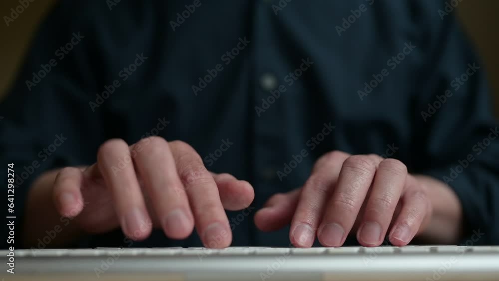 Poster businessman working and typing on computer keyboard