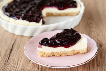 Blueberry cheese pie with cracker, cream cheese, blueberry sauce