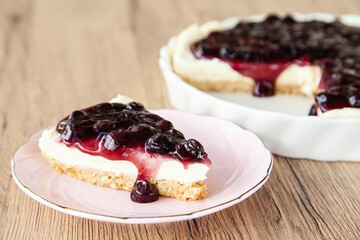 Blueberry cheese pie with cracker, cream cheese, blueberry sauce