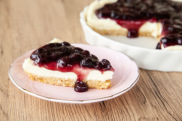 Blueberry cheese pie with cracker, cream cheese, blueberry sauce