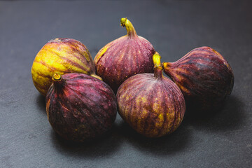 figs on a stone plate isolated.