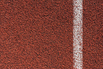 Running track surface with lanes and lines on a track and field athletics stadium. Sport running,...