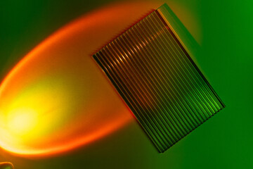 Red and green gradient light.  Podiums in neon lights on abstract background. Trendy geometric shapes. Mock up. Minimalism, 90s, 80s concept. close up