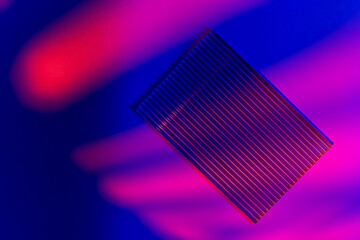 Blue and red gradient light. Palm tree leaves and podiums in neon lights on abstract background. Trendy geometric shapes. Mock up. Minimalism, 90s, 80s concept. close up