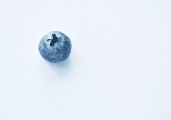 close up of fresh blueberry purple fruit arranging on white background