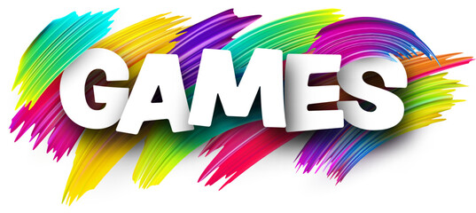 Games paper word sign with colorful spectrum paint brush strokes over white.