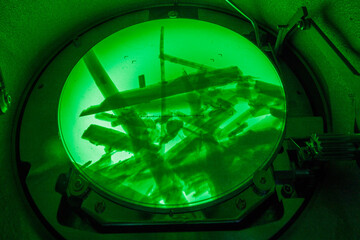 Actinolite fibers (asbestos variety) seen on the fluorescent screen of a transmission electron microscope (TEM), x40 000 magnification. Environmental laboratory specialised in asbestos