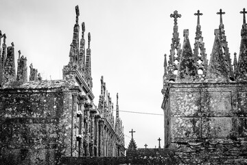 VILALBA, SPAIN - AUGUST 5, 2022: Alba Neo-Gothic Cemetery, with the characteristic pinnacles, the work of stonemasons from the Terra Cha region since the 16th century. - obrazy, fototapety, plakaty