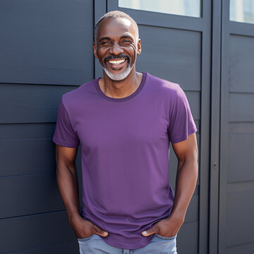 Handsome african american man wearing a purple t shirt. T shirt mockup image 