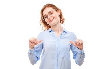 Portrait of young redhead woman smiling, looking confident, pointing oneself with fingers isolated...