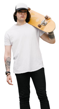 Man wearing white blank t-shirt and a baseball cap with space for your logo or design. He is holding a skateboard