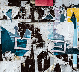 Torn Ripped Aged Colorful Paper Posters. Urban Street Gray Wall Surface. Grunge Rough Dirty...