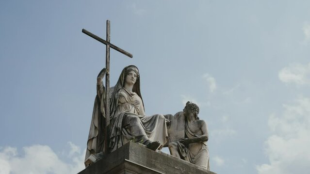 statue on the door of the church of gran madre de diostras la reja in the city of torino, italy