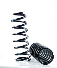 Heavy Duty Coil Springs for a truck on a white background. High quality photo