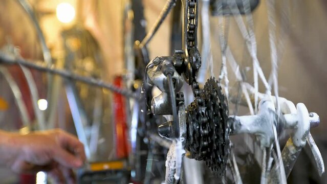 Bicycle mechanic adjusting gearshift mechanism