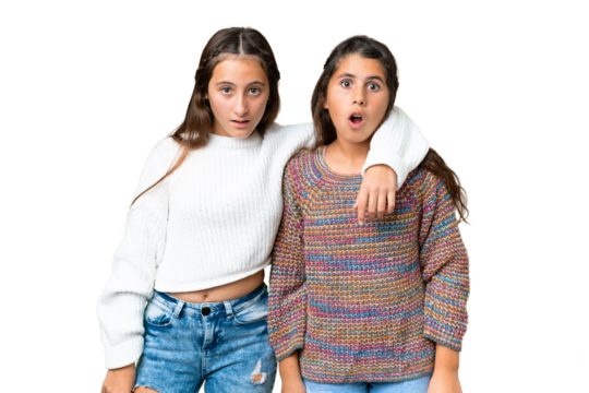 Friends girls over isolated chroma key background with surprise facial expression