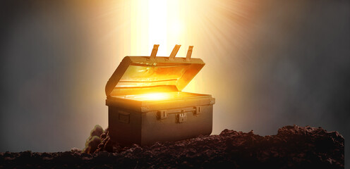 Old treasure chest with glow from inside