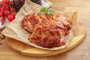 Marinated chicken leg in tomato sauce
