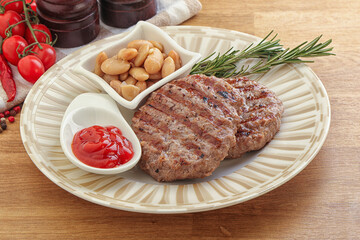 Grilled beef burger cutlet with sauce
