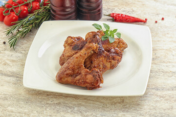 Roasted chicken wings with spicy sauce