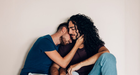 gay man in love - homosexual male couple hugging - happy together