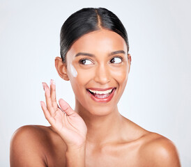 Happy woman, beauty and cream on face, dermatology and skincare on white background. Lotion, sunscreen and moisturizer with wellness, skin with glow and facial mask for cosmetic care in a studio