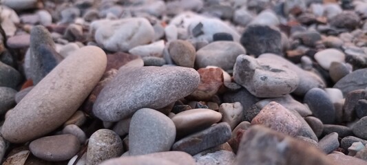 See pebbles on the beach.