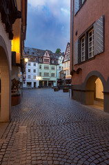 Fototapeta premium Facades of old traditional houses in the market square at dawn. Cochem. Germany.