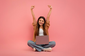 Happy Teen Girl With Laptop Celebrating Success On Pink Background