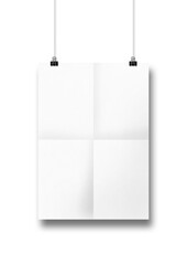 White folded poster hanging on a clean wall with clips