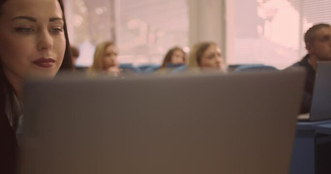 Students at class listening to lectures