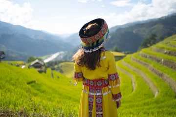 Papier Peint photo autocollant Mu Cang Chai A farmer woman with fresh paddy rice terraces, green agricultural fields in countryside or rural area of Mu Cang Chai, mountain hills valley in Asia, Vietnam. Nature landscape. People lifestyle.
