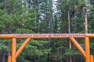 Fototapeta na wymiar The entrance to Johnston Canyon in Banff National Park, Alberta, Canada - July 12, 2023. Johnston Canyon Trail to Upper Falls is an extremely popular and scenic trail in Banff National Park.