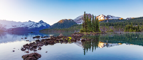 Glacier Lake with trees and Canadian Mountain Landscape. Garibaldi Lake, Whistler, BC, Canada.