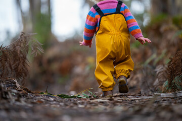 kid playing in the wild