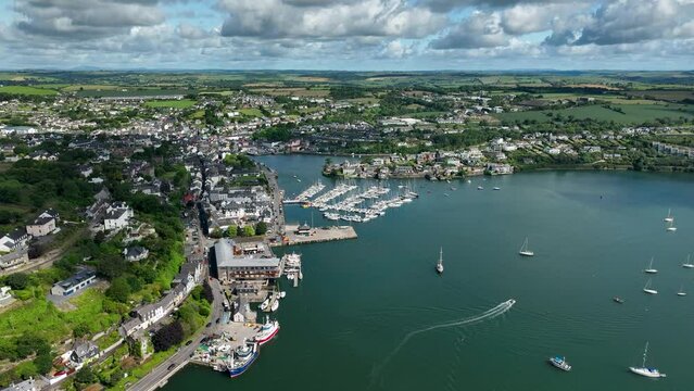 Aerial drone footage of Kinsale Pier with Sailboats 4k Ireland Summer