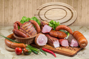 Meat products still life. Abundance of kind sausages, beaf and vegetables. Copyspace ares