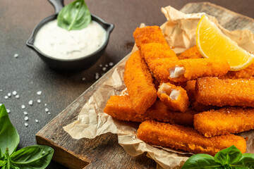 Crispy Fish strips with tartar sauce. Restaurant menu, dieting, cookbook recipe top view