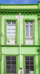 Fototapeta na wymiar Street view of an old colonial building facade, Cuenca, Ecuador.