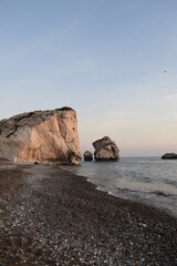 Aphrodite rock in the rays of the setting sun