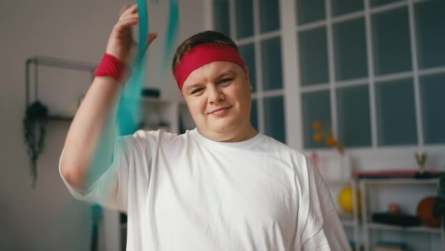 Young Overweight Man Throwing Away Measurement Tape, Body Positivity Movement