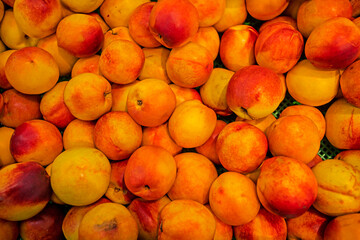 Fototapeta na wymiar background of fresh appetizing ripe peaches