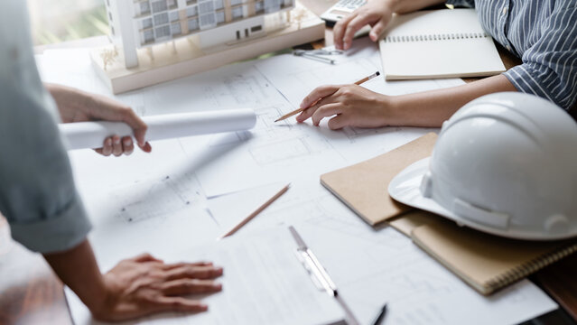 Architect working on the desk, construction project ideas architecture engineer Concept..