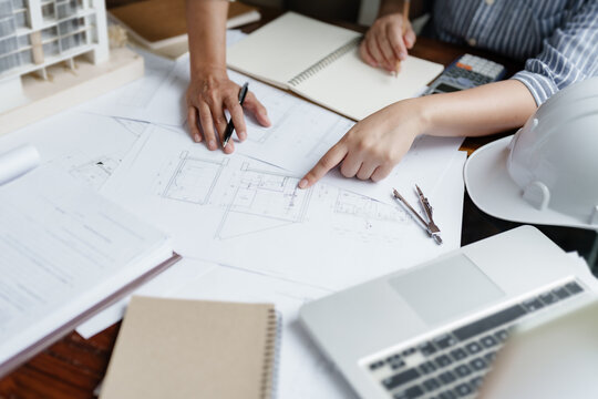 Architect working on the desk, construction project ideas architecture engineer Concept..