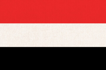 flag of Yemen. National Yemen flag on fabric surface.
