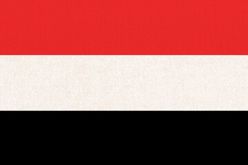 flag of Yemen. National Yemen flag on fabric surface.