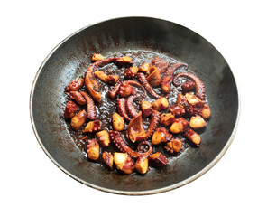 Classic cooking octopus in the village. Boiling and frying clam tentacles. Sea food.