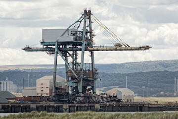 Fototapeta na wymiar Industrial Site, Teesside shipping port heavy crane 