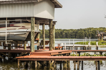 Fishing dock on Louisiana swamp lake.
